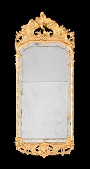 512. A Swedish Rococo mirror by S Boman.