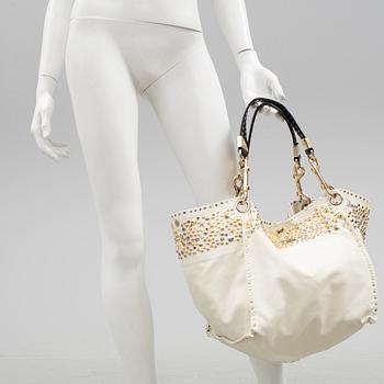 A white leather bag from Jimmy Choo.