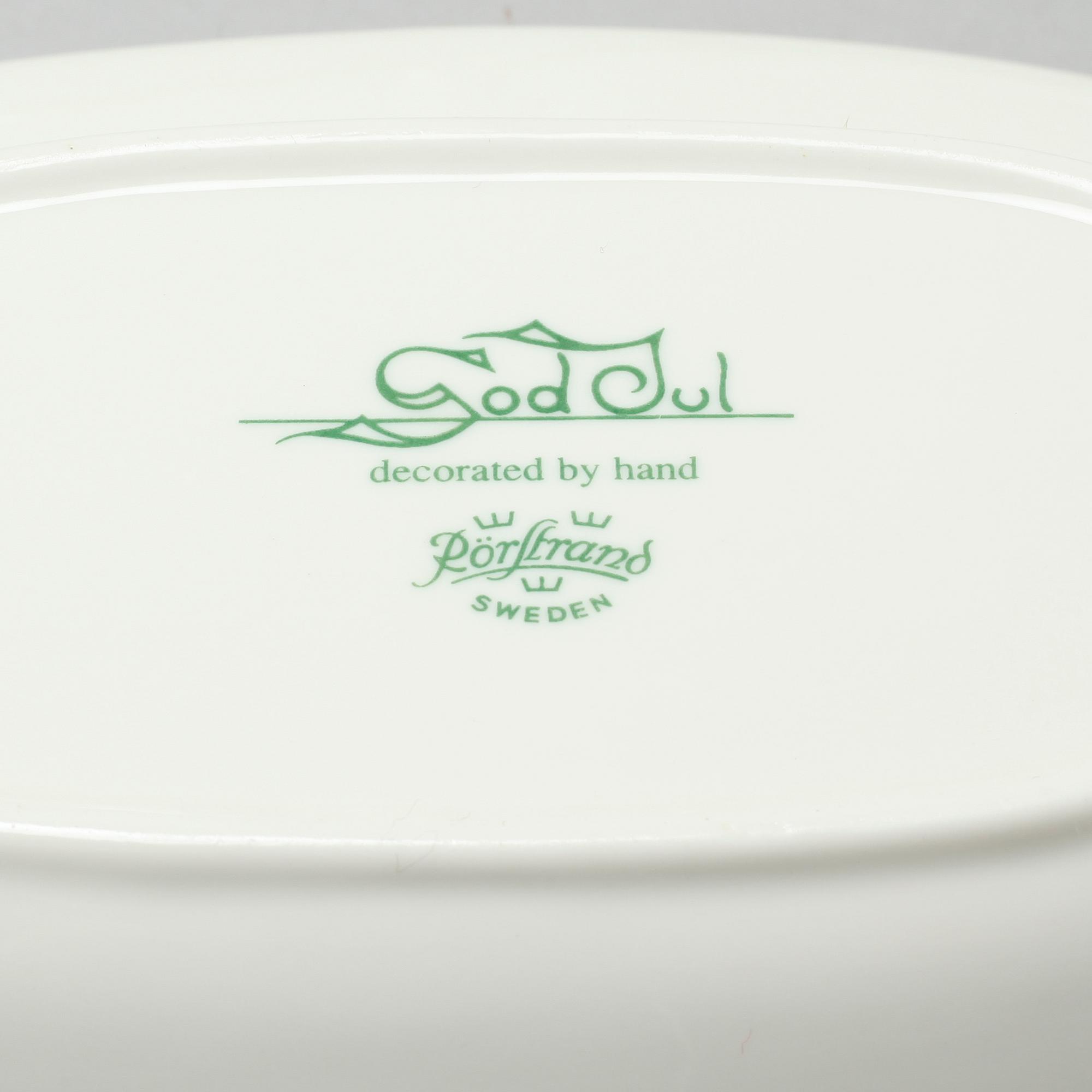 A christmas porcelian tableware set of 37 pcs by Rörstrand from the latter half of the 20th century.