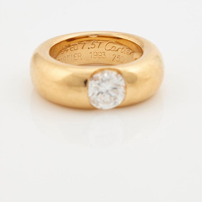 A oval brilliant cut diamond ring by Cartier.