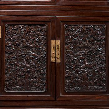 A pair of Chinese hardwood cupboards, late Qing dynasty (1644-1912).