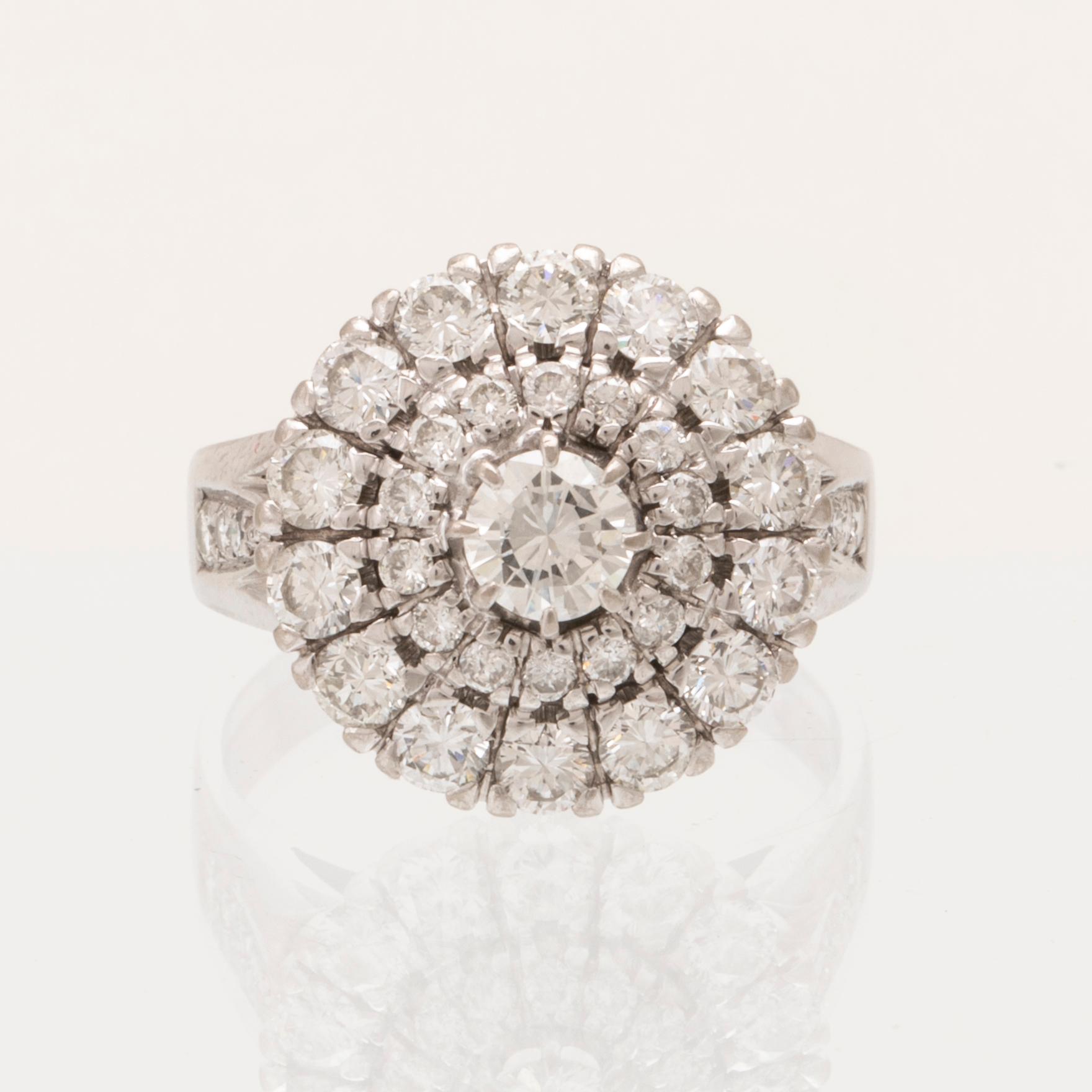 An 18K white gold ring/cocktail ring with round brilliant-cut diamonds, Petterssons Eftr Juvelerar Ab Joh Stockholm 1945.