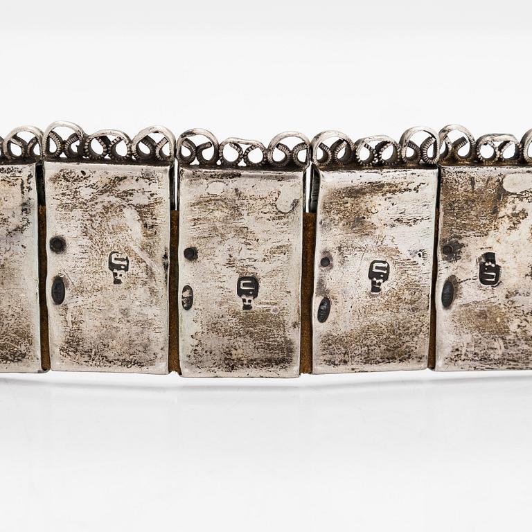 A Caucasian silver and leather belt with niello, early 20th century.