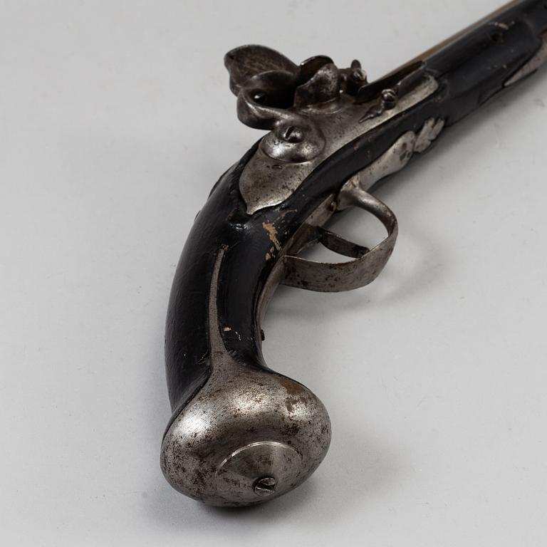 One flint lock postol, late 18th ct, and one percussion pistol, 19th ct.