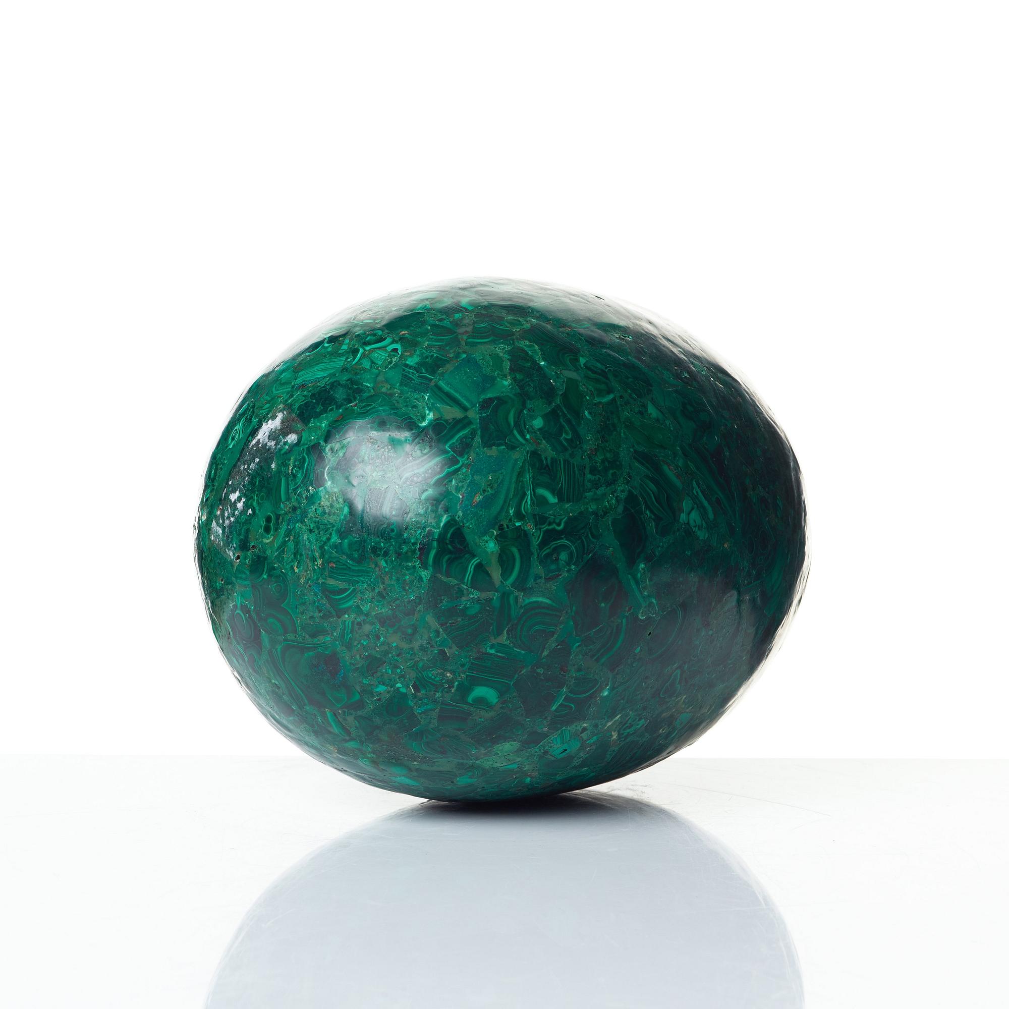 A Russian 19th Century malachite veneered egg.