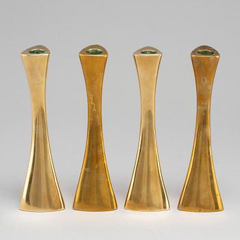 Four brass candle sticks by Karl Erik Ytterberg, 1960's.