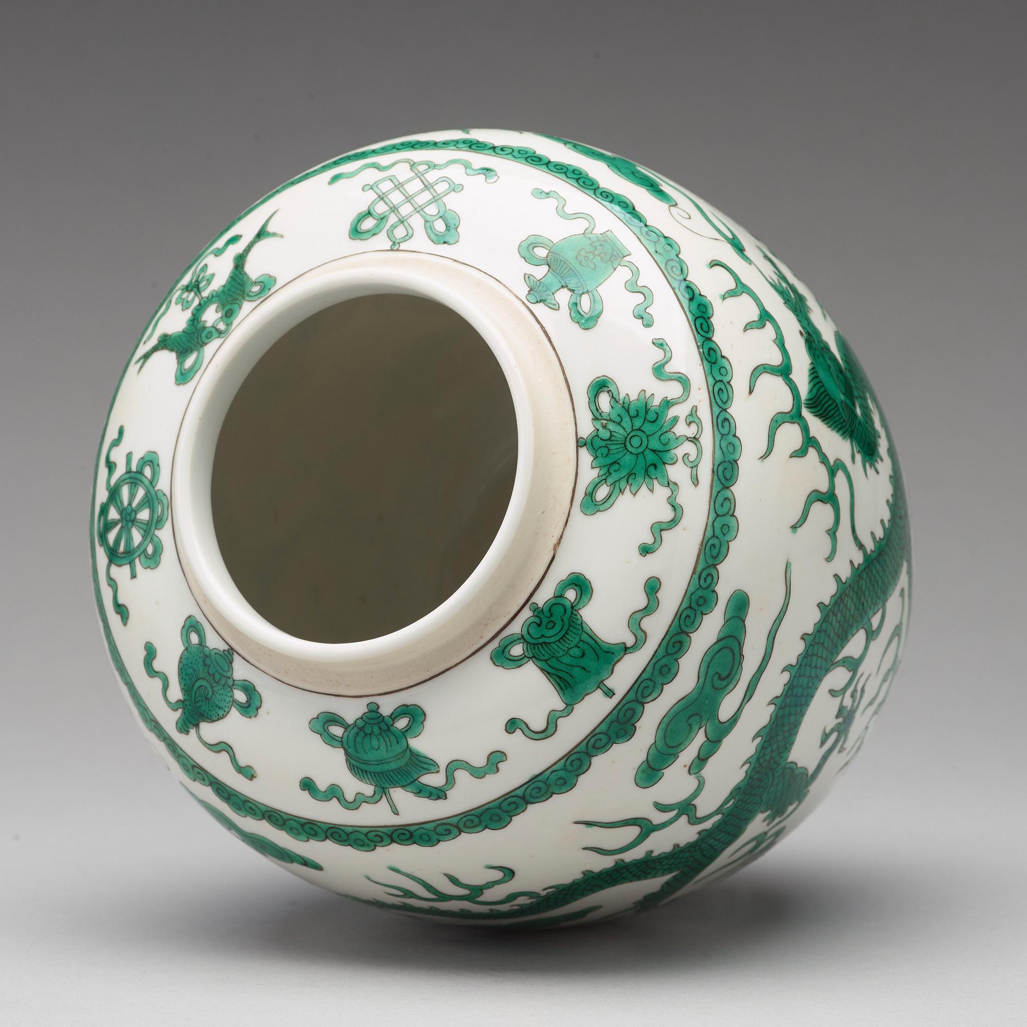 A green enamelled dragon jar, China, circa 1900.