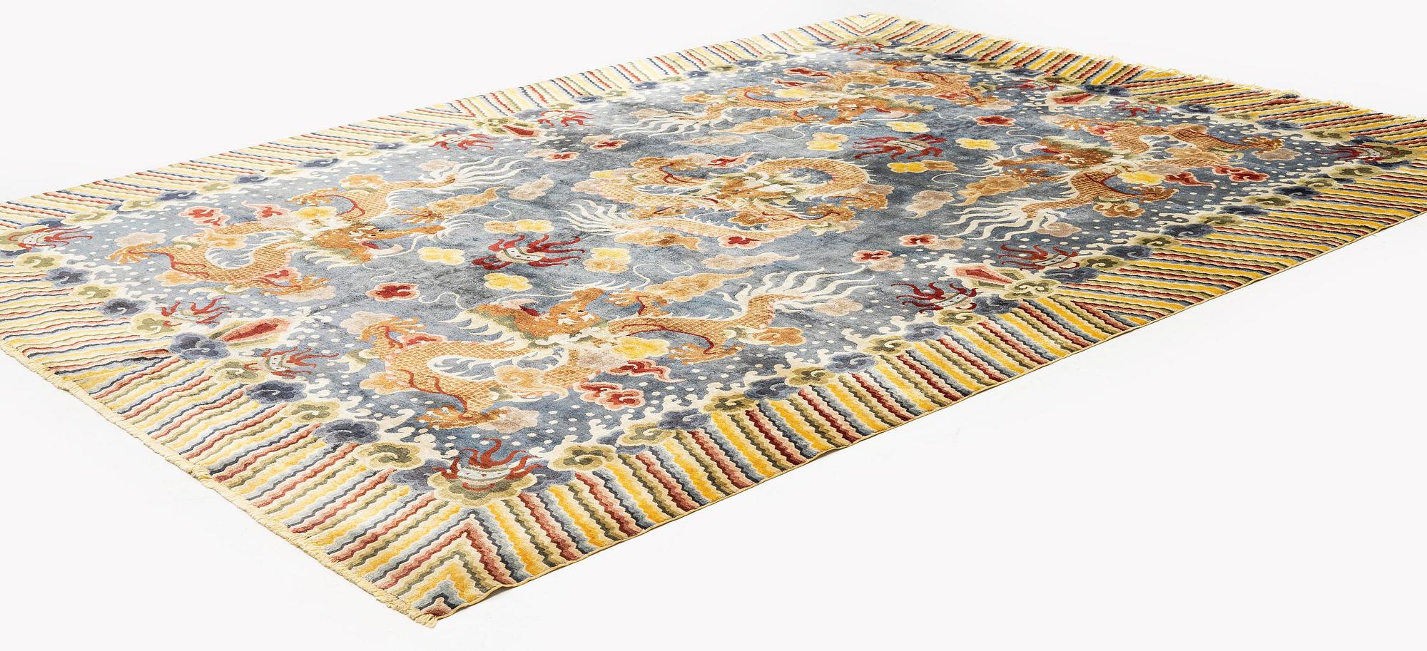A semi-antique chinese ' Five dragon' silk carpet, c 335 x 254 cm.