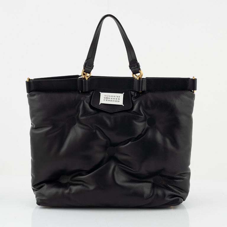 Maison Margiela, a black leather "Glam Slam" bag.