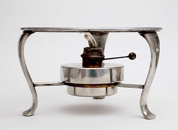 A Svenskt Tenn pewter sauce pot on stand with a heater, Stockholm 1950 and 1954.