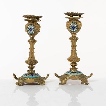 A pair candlesticks and an inkwell, circa 1900.