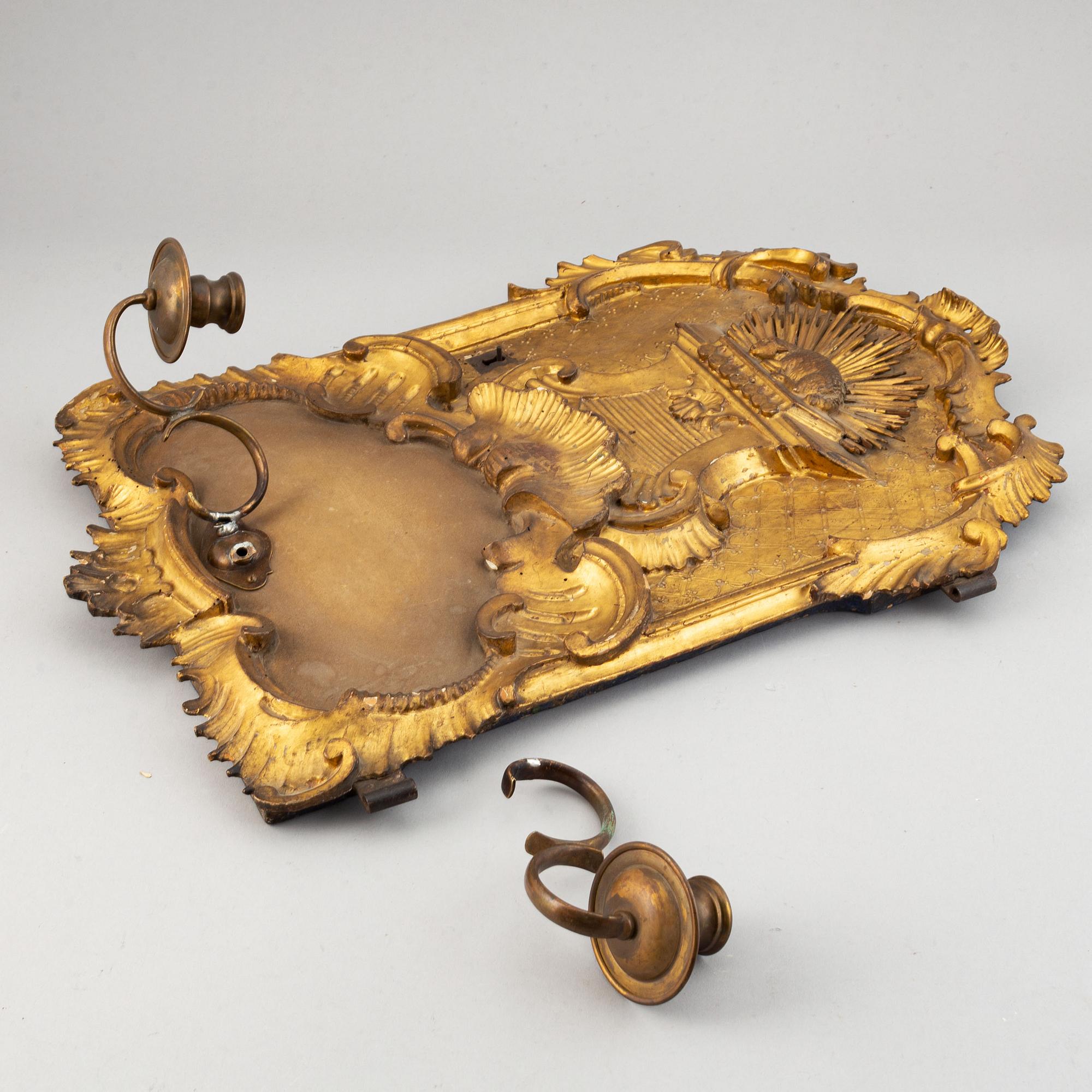 An 18th century  Rococo wall sconce for two candles.