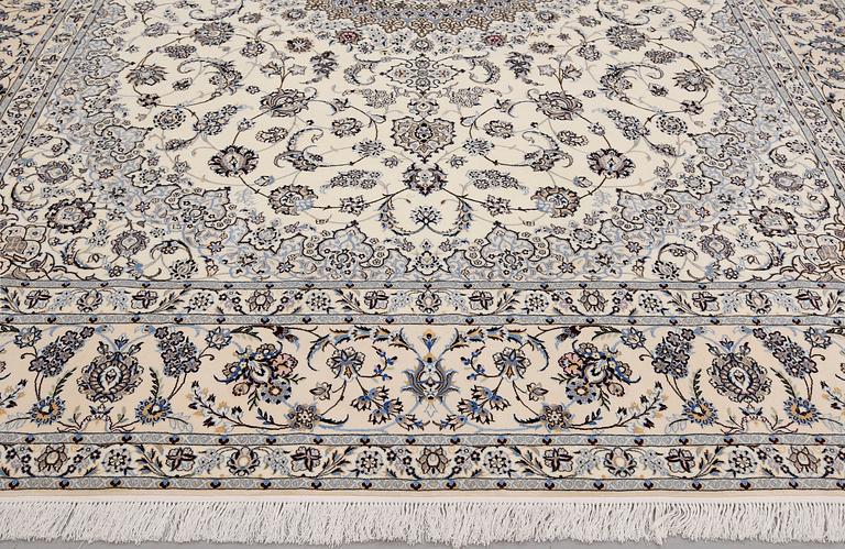 A Nain part silk carpet, 408 x 308 cm.