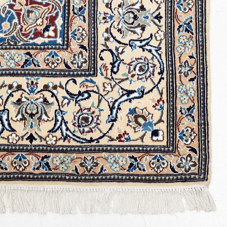 A part silk Nain 9la carpet, c. 300 x 195 cm.