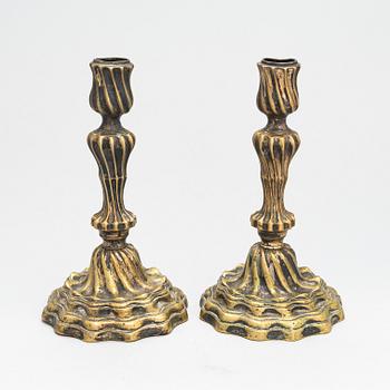 A pair of Louis XV argent haché candlesticks, France 18th-century.