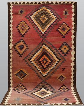 A Persian Nomad kilim carpet, ca 258 x 150 cm.