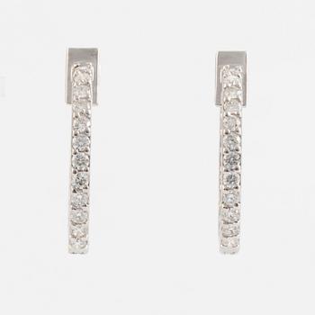 Brilliant cut diamond hoop earrings.