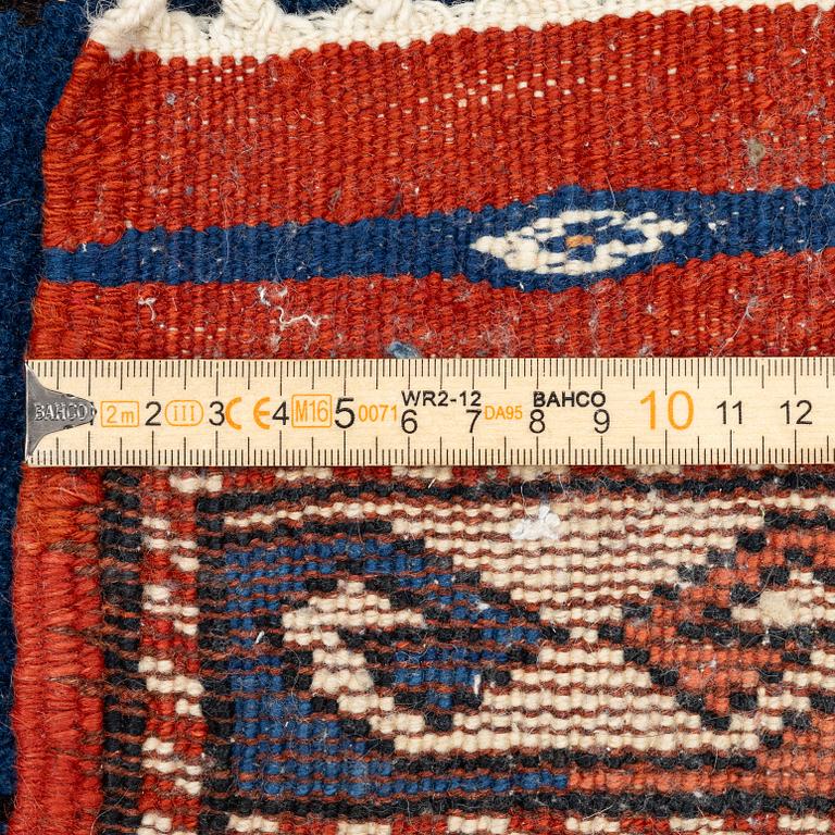 A semi-antique Turkish rug, 175 x 123 cm.