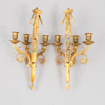 A pair of wall lights, Louis XVI style, end of the 19th Century.