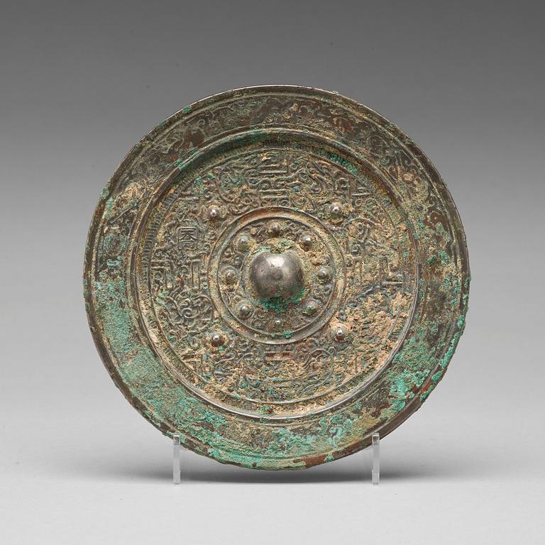 SPEGEL, brons. Handynastin (206 f.Kr.-220 e. Kr.).