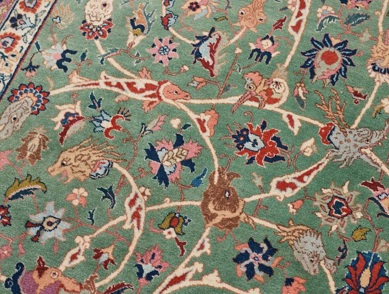 A carpet, a semi-antique Tabriz, ca 374-376,5 x 268-276 cm.