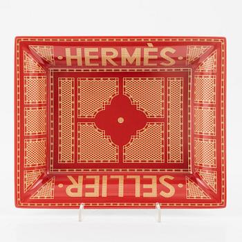 Hermès, a 'Sellier' porcelain change tray.