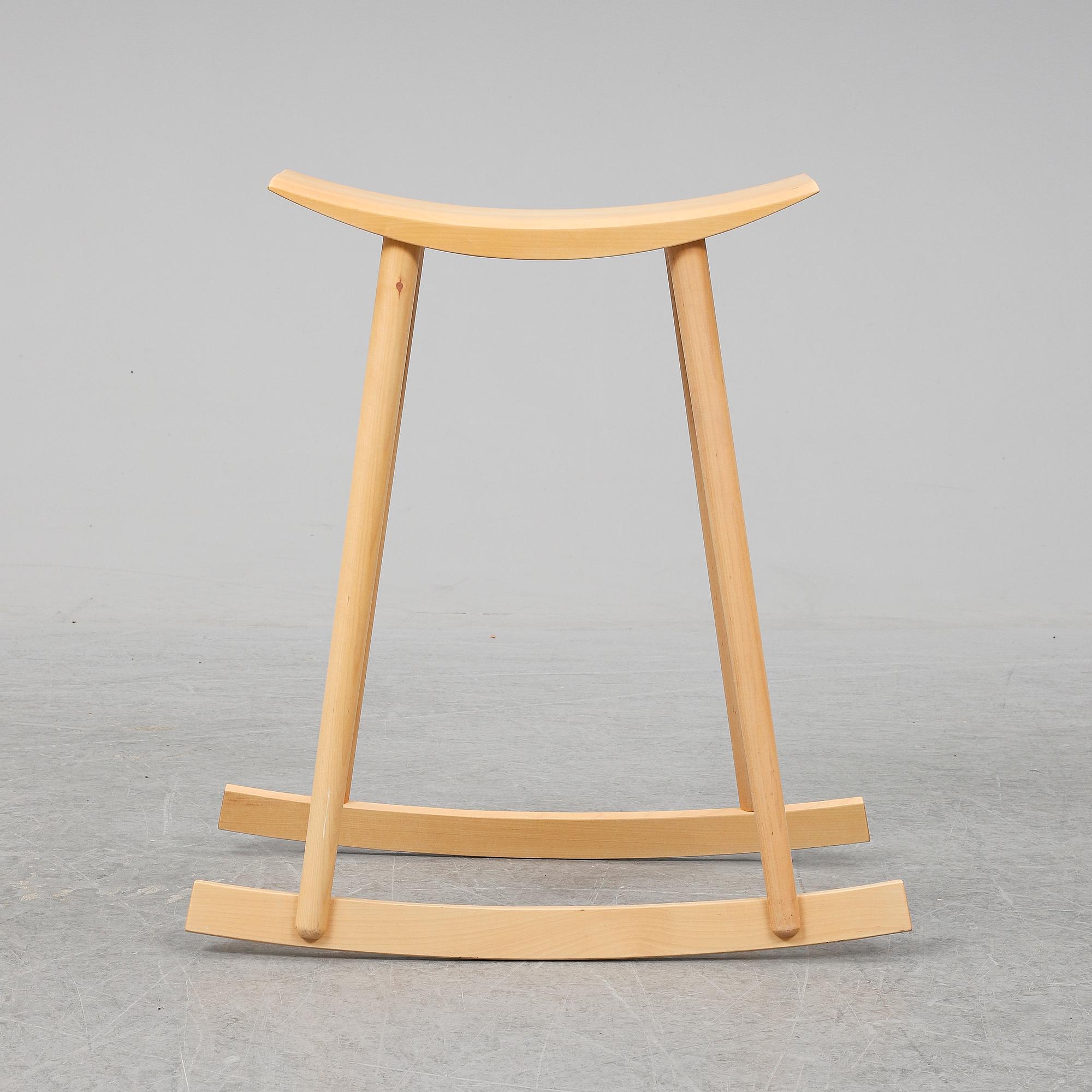 PER SUNDSTEDT, a wood rocking stool from Pyra.