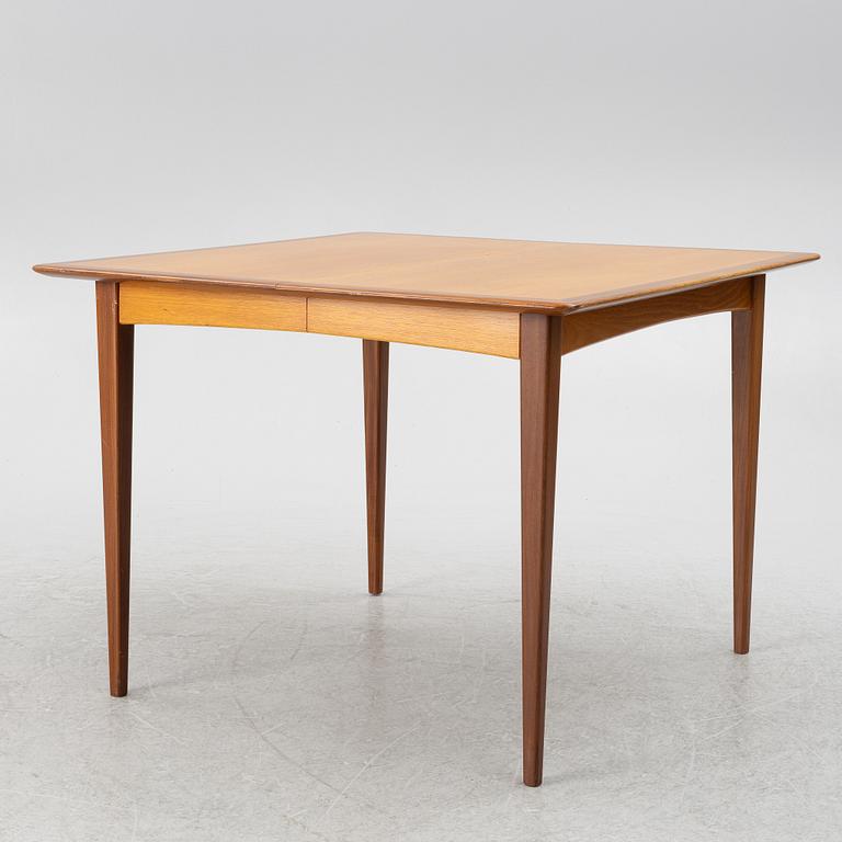 A dining table and four chairs, 1950s-60s.