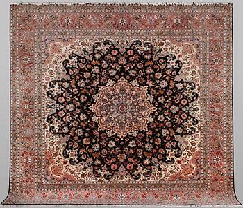 A carpet, Tabriz, part silk, 60 Raj, 300 x 290 cm.