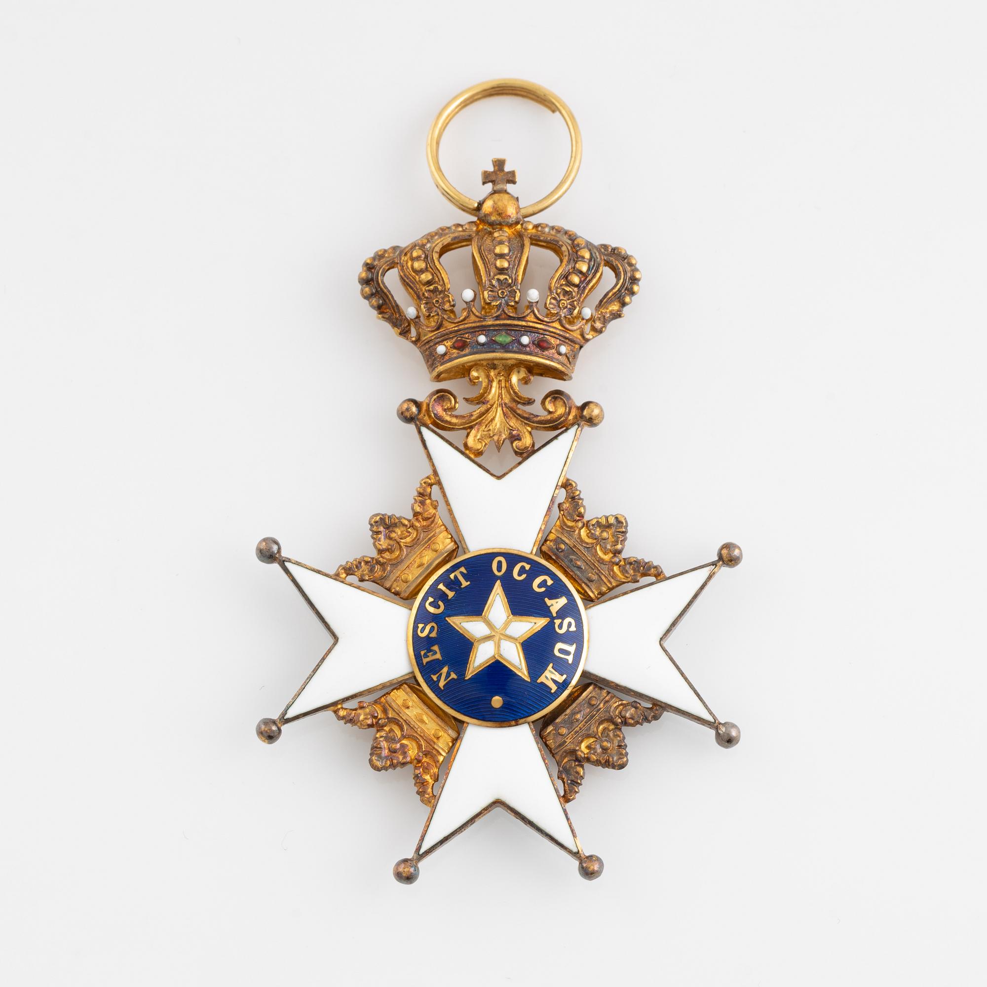 Nordstjärneorden, Riddartecken i etui, 18 k guld och emalj, CF Carlman Stockholm.