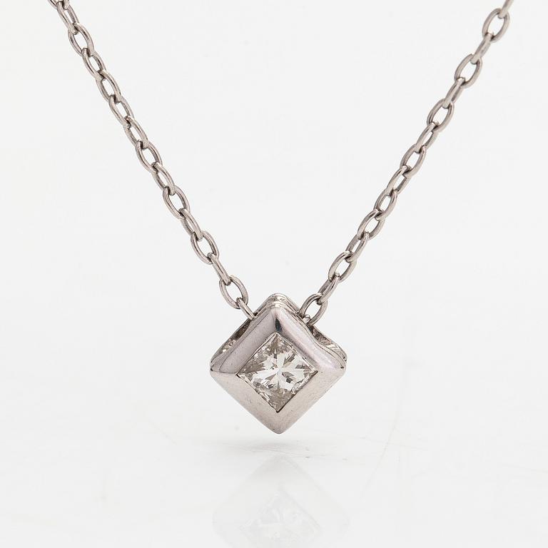 A platinum necklace with a 0.12 ct princess cut diamond.