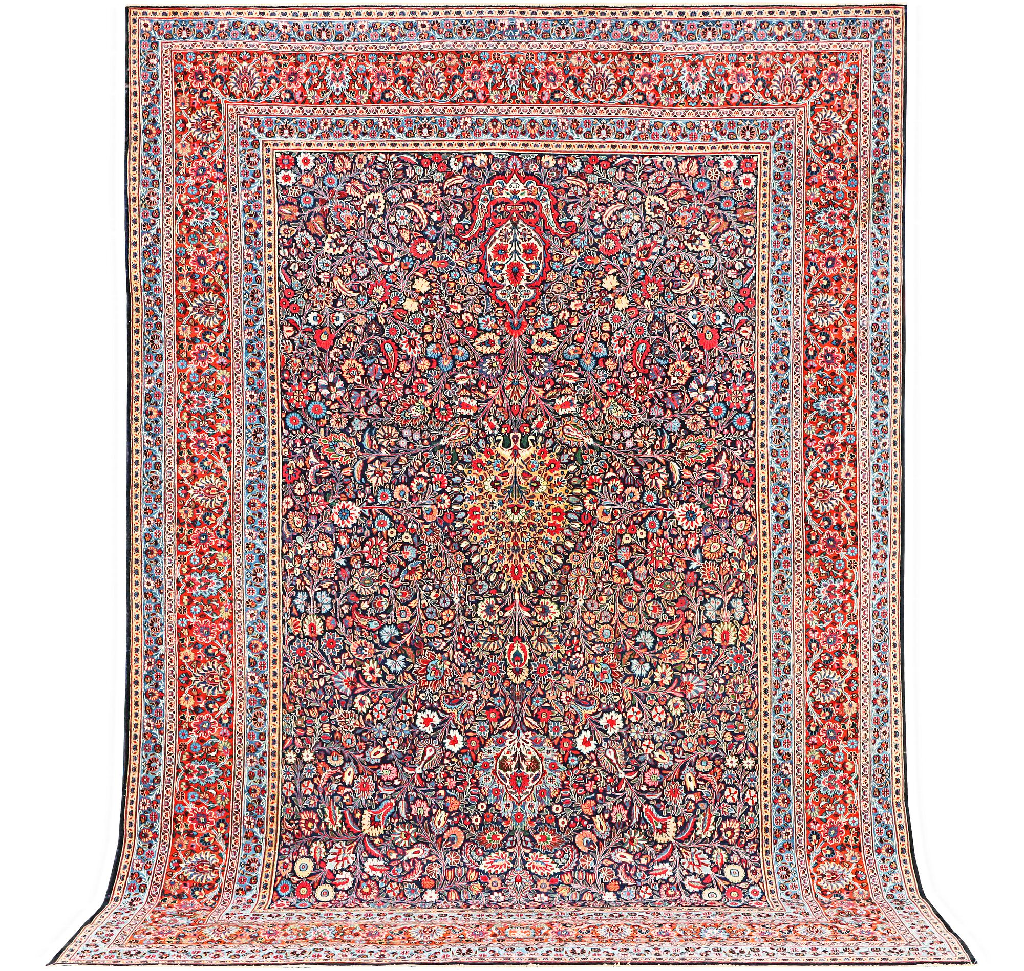 A semi-antique Meshad carpet, a. 360 x 252 cm.