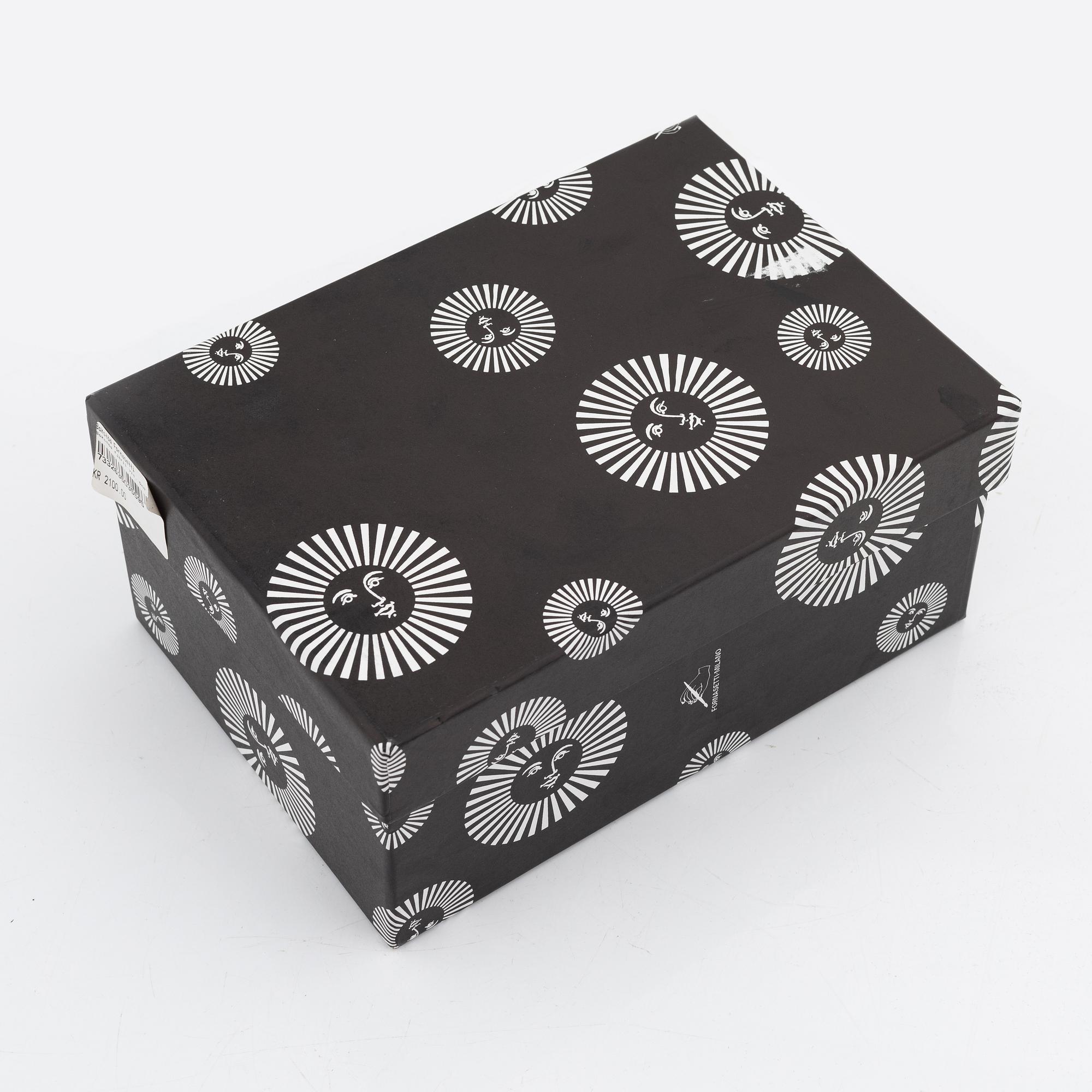 Piero Fornasetti, a pair of metal book stands.