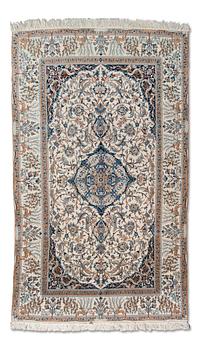 63. A carpet, Nain. Circa 273x161 cm.