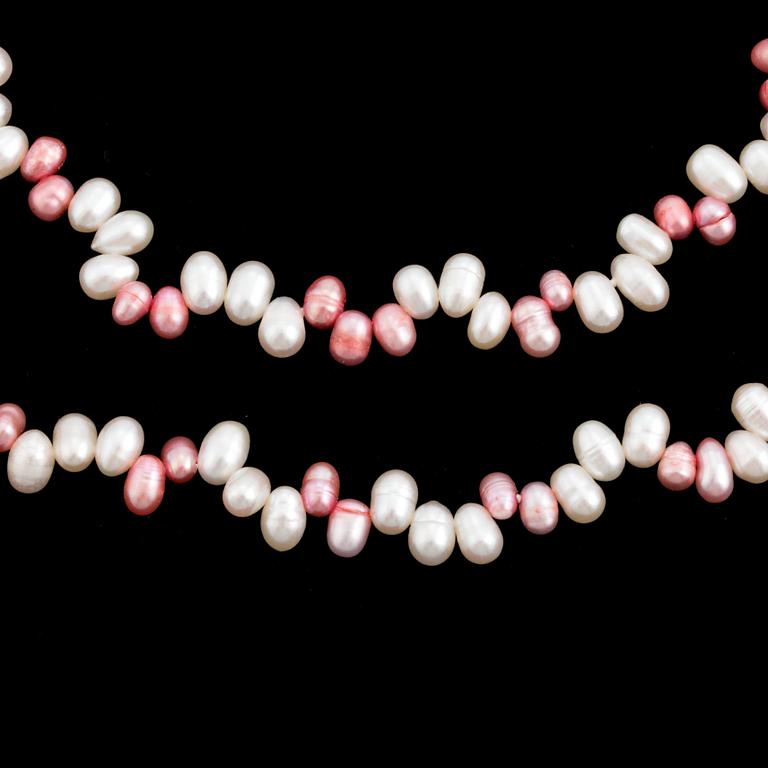 Two necklaces of cultured, freshwater pearls.