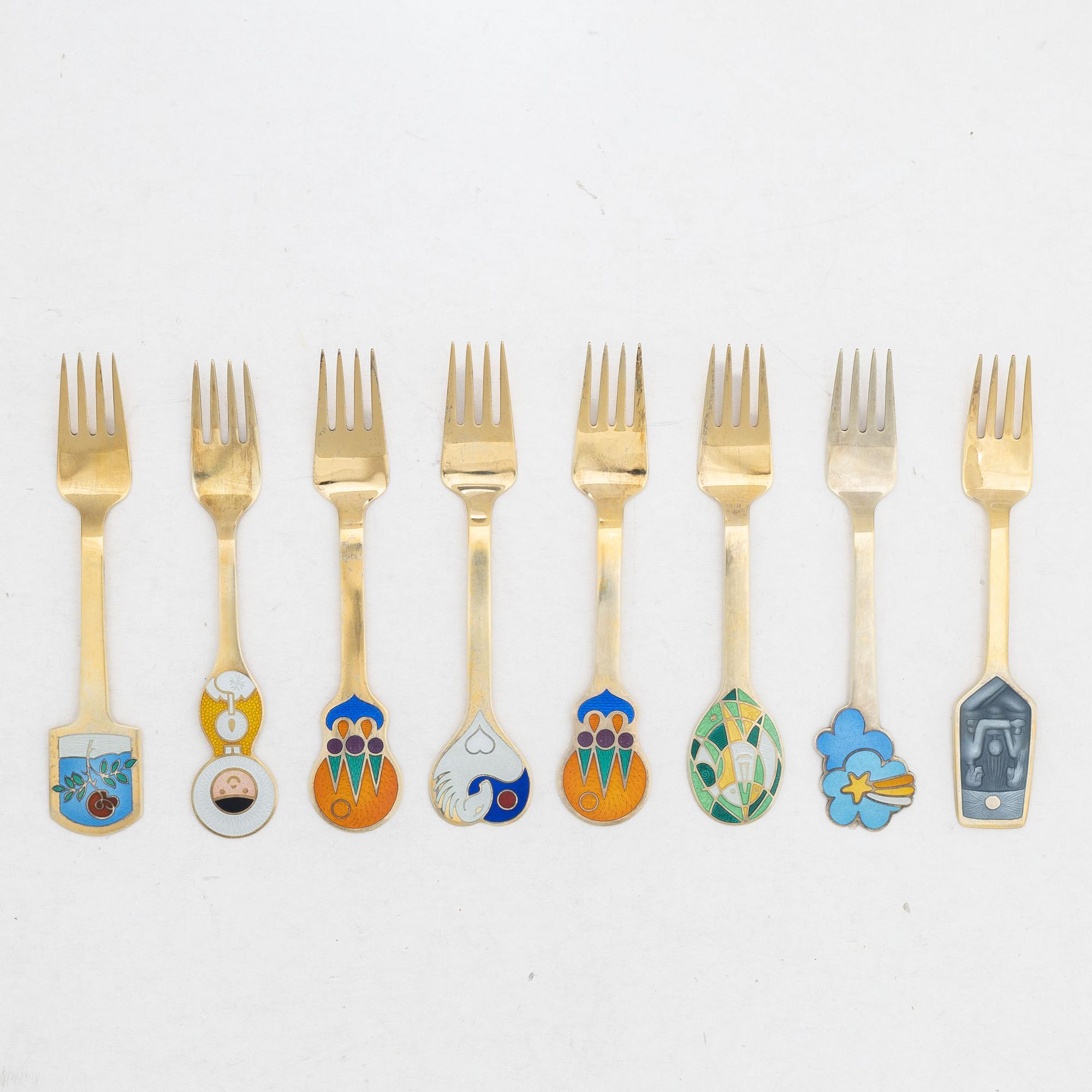 Anton Michelsen, Annual/Christmas spoons, 8 pcs, gilt sterling silver and enamel, Denmark.