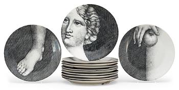 9. A Piero Fornasetti set of twelve 'Eva' porcelain plates, Milano, Italy.