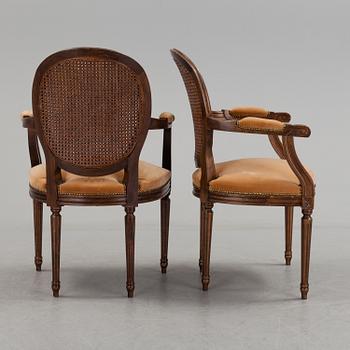 A pair of Gustavian style armchairs, second half of the 20th Century.