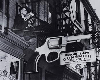 Weegee, "Shooting in front of my studio", ca 1939.