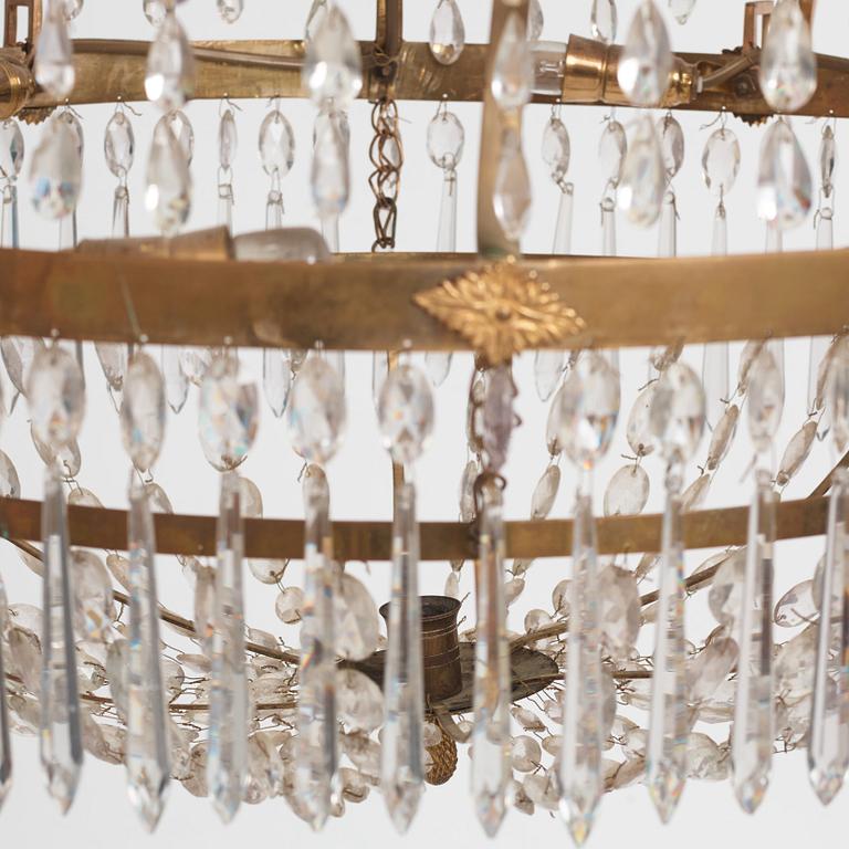 A late Gustavian gilt brass and cut glass seven-light chandelier, Stockholm, late 18th century.