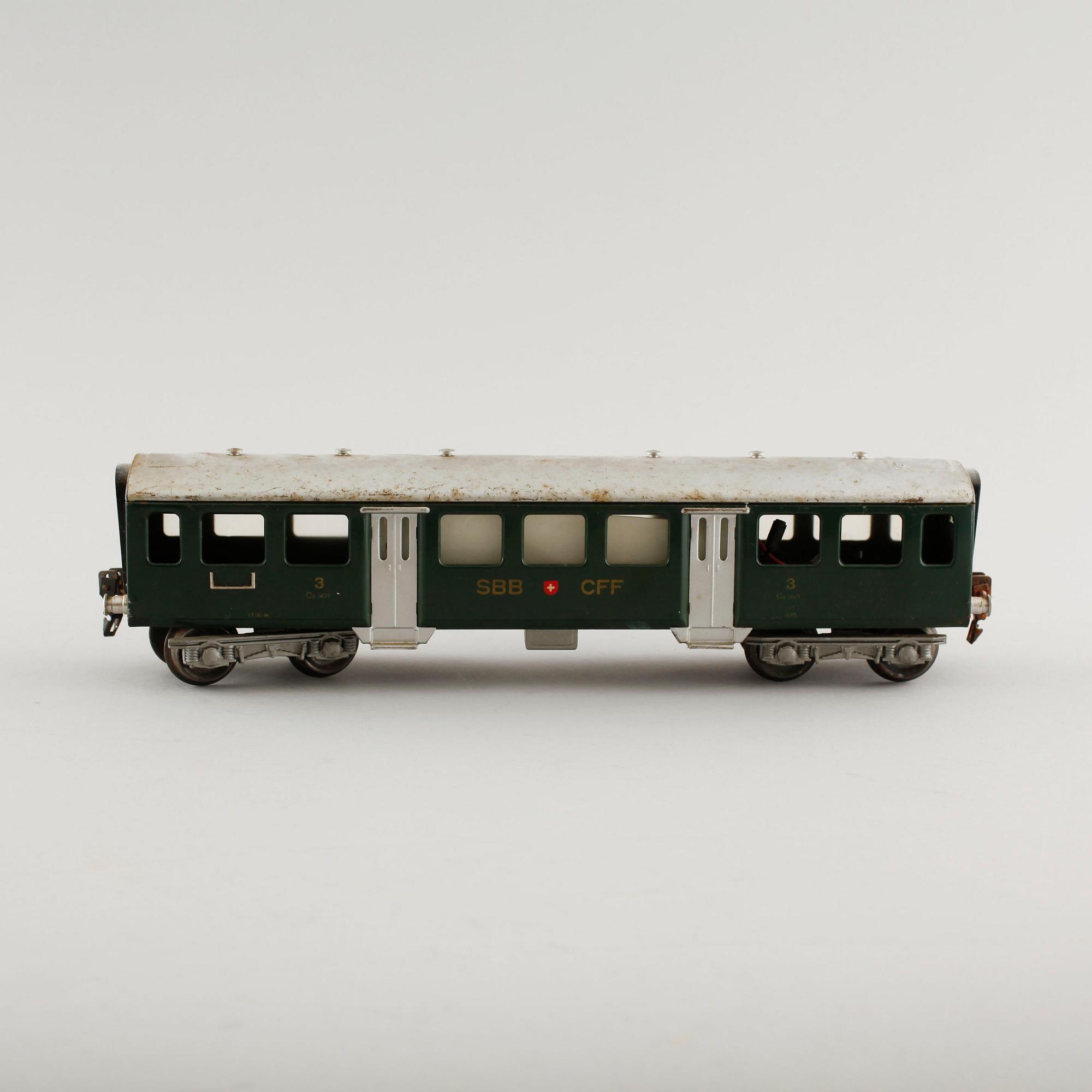 A 1940/50s model train set of 31 pcs in O-scale made by HAG, Switzerland.