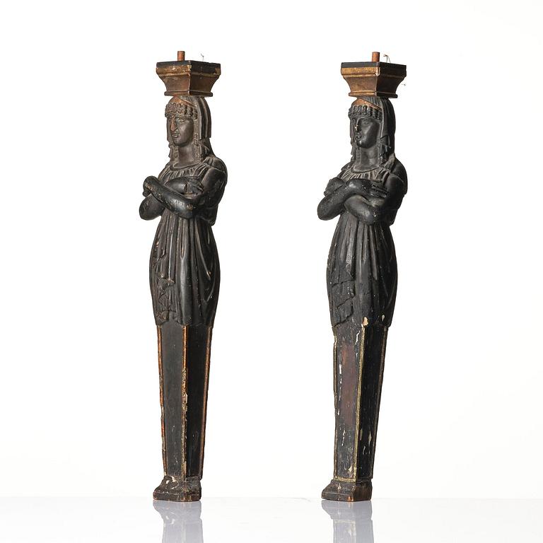 A pair of late Gustavian carved caryatids in the manner of Pehr Ljung (1743-1819) and Ernst Philip Thomann (1760-1833).