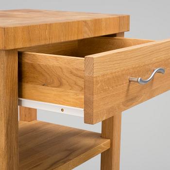 A 21th century oak kitchen island.