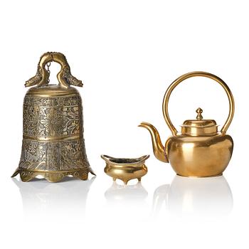 1173. A small tripod censer, a temple bell and a tea pot with cover, Qing dynasty.