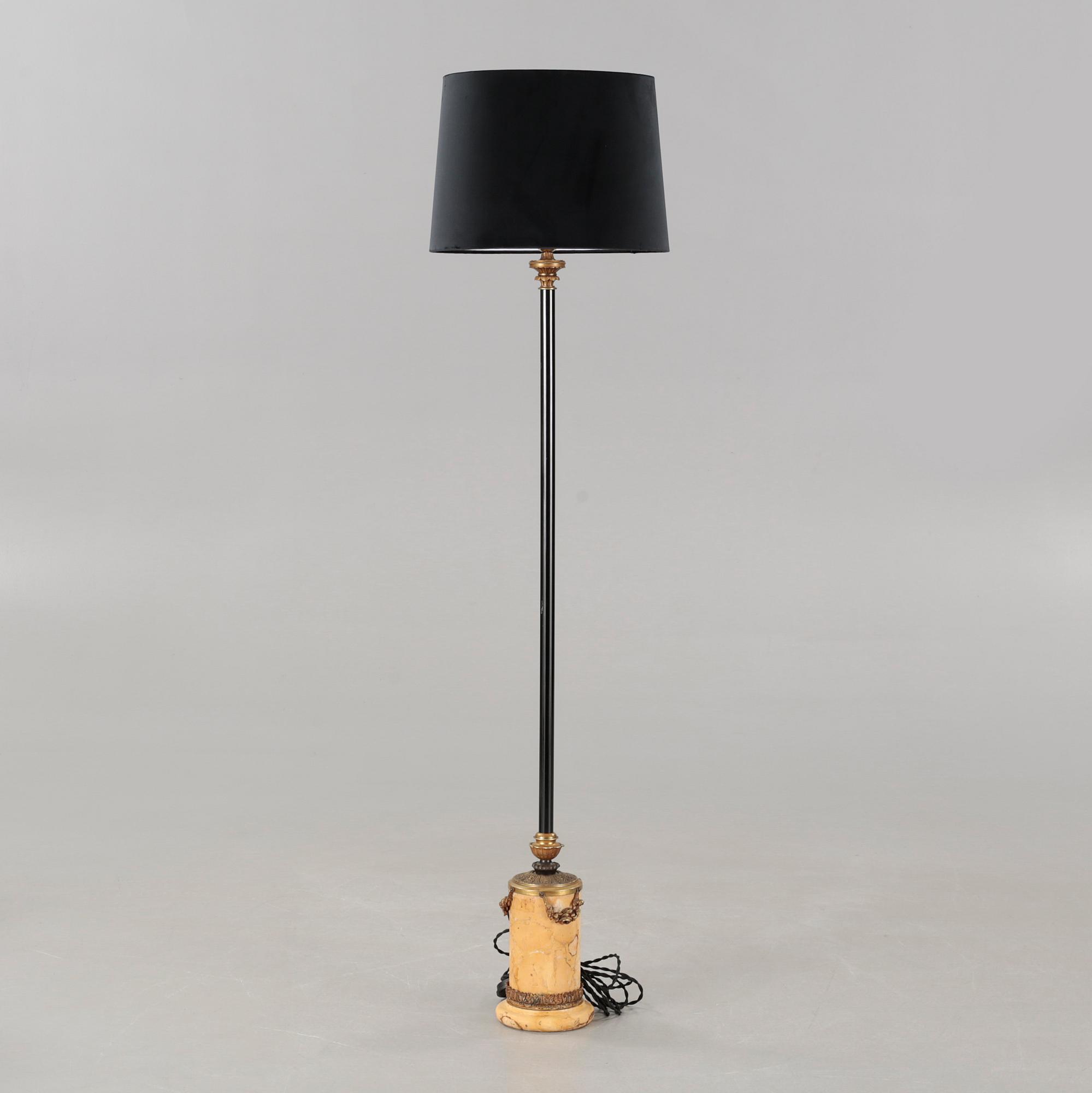 A floor lamp, made in the first half of the 20th century.