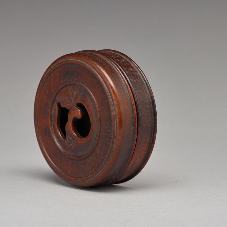 A Chinese wooden box with cover.