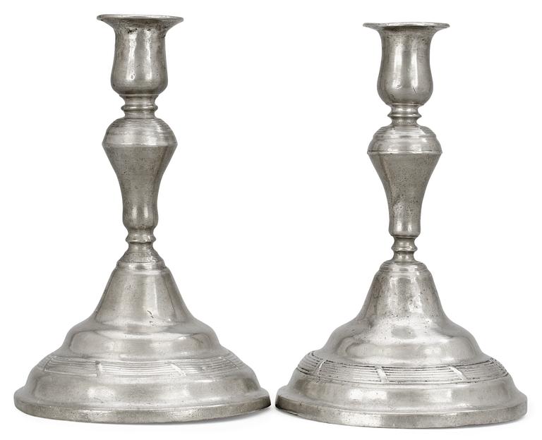 A pair of Rococo pewter candlesticks by F. Ahlman, Karlskrona, Sweden 1785.