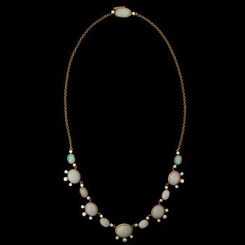 A NECKLACE, cabochon cut opals, brilliant cut diamonds, 18K gold. A. Tillander, Helsinki Finland 1966.