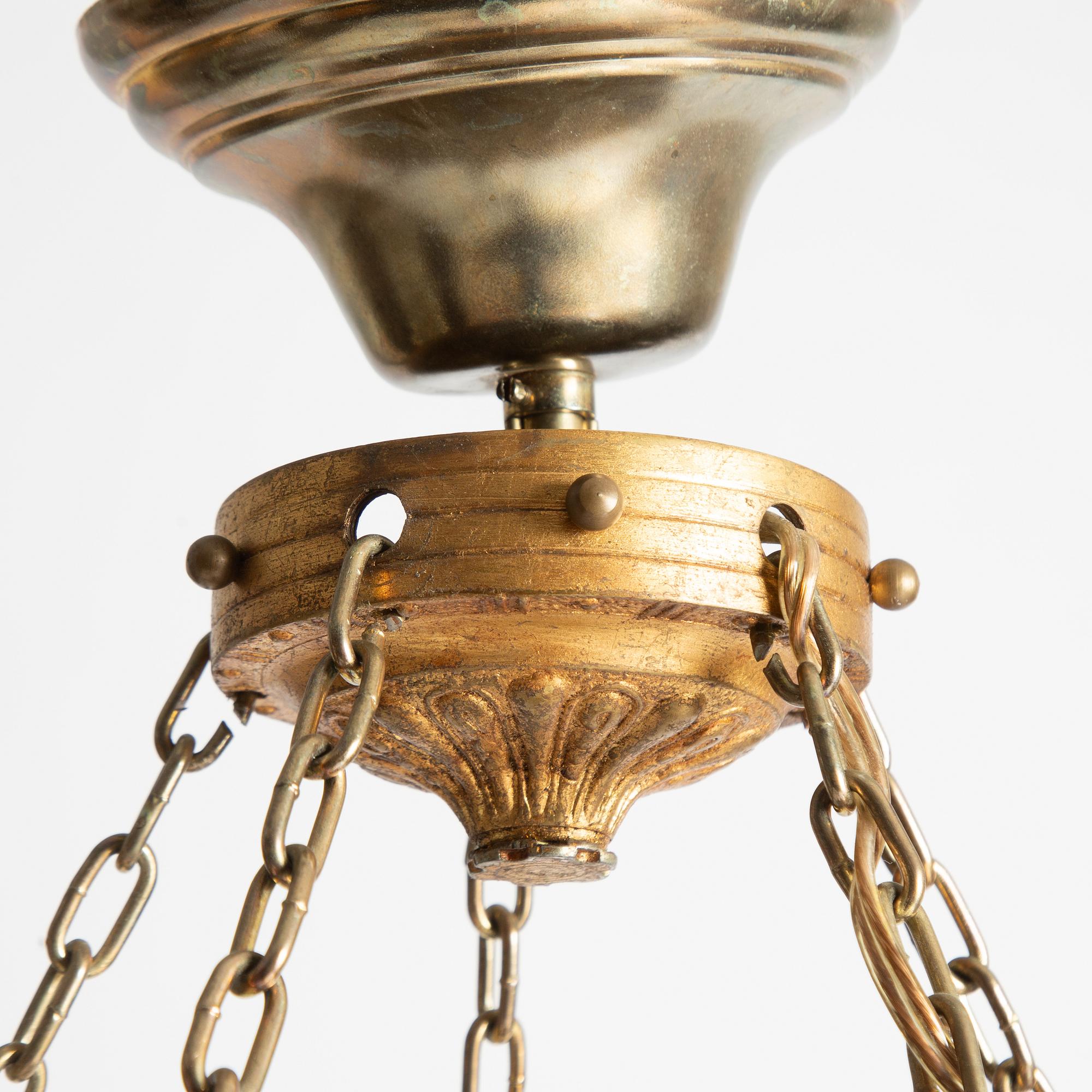 An Empire style chandelier, early 20th century.