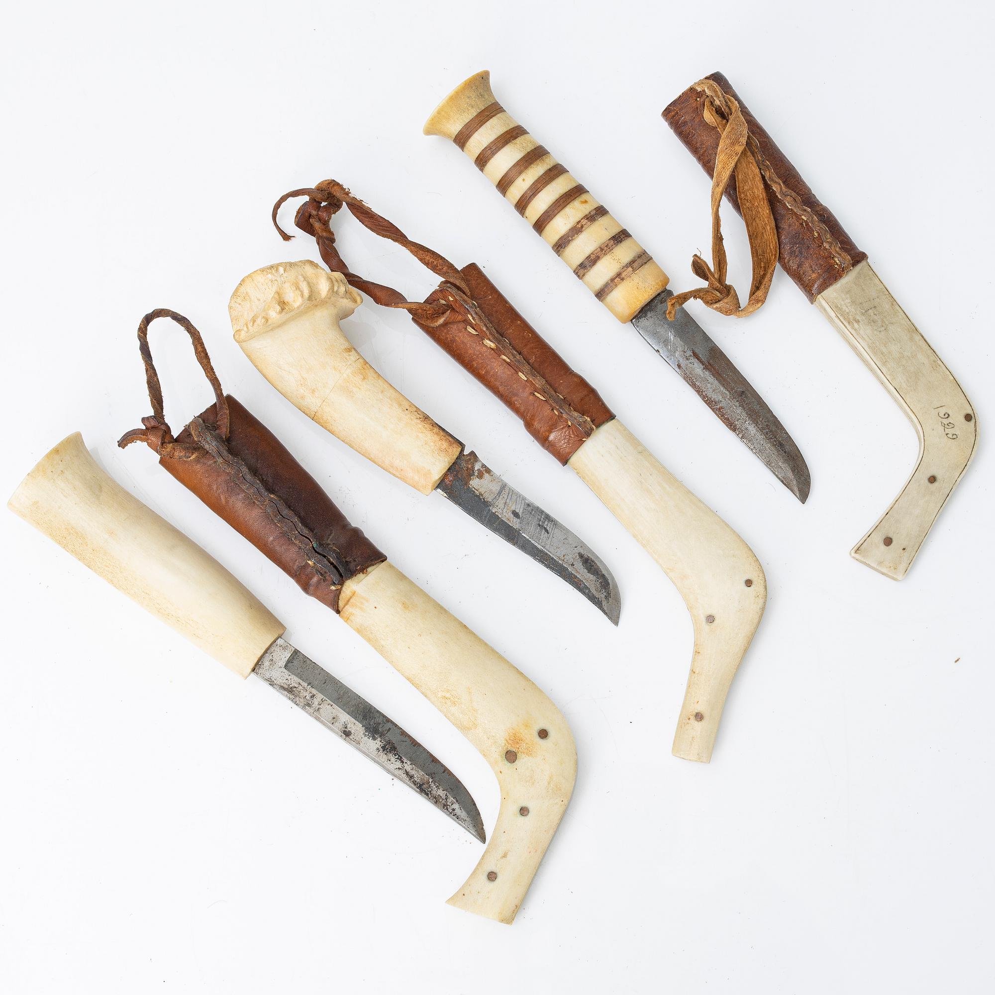 Nine half-horn knives, unidentified craftsman.